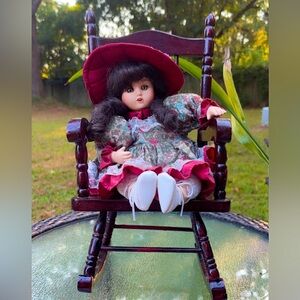 Wind up Porcelain Doll with Rocking Chair